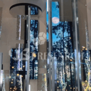 Exhibition scenes from Touch Taiwan 2026 showcasing next-generation Micro-LED displays and automotive smart cockpits by AUO, Innolux, and PlayNitride.